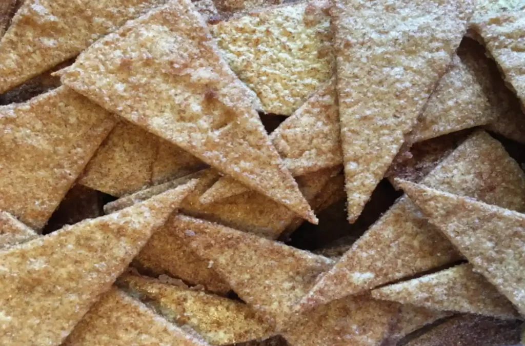 homemade cinnamon chips dusted with sugar and cinnamon