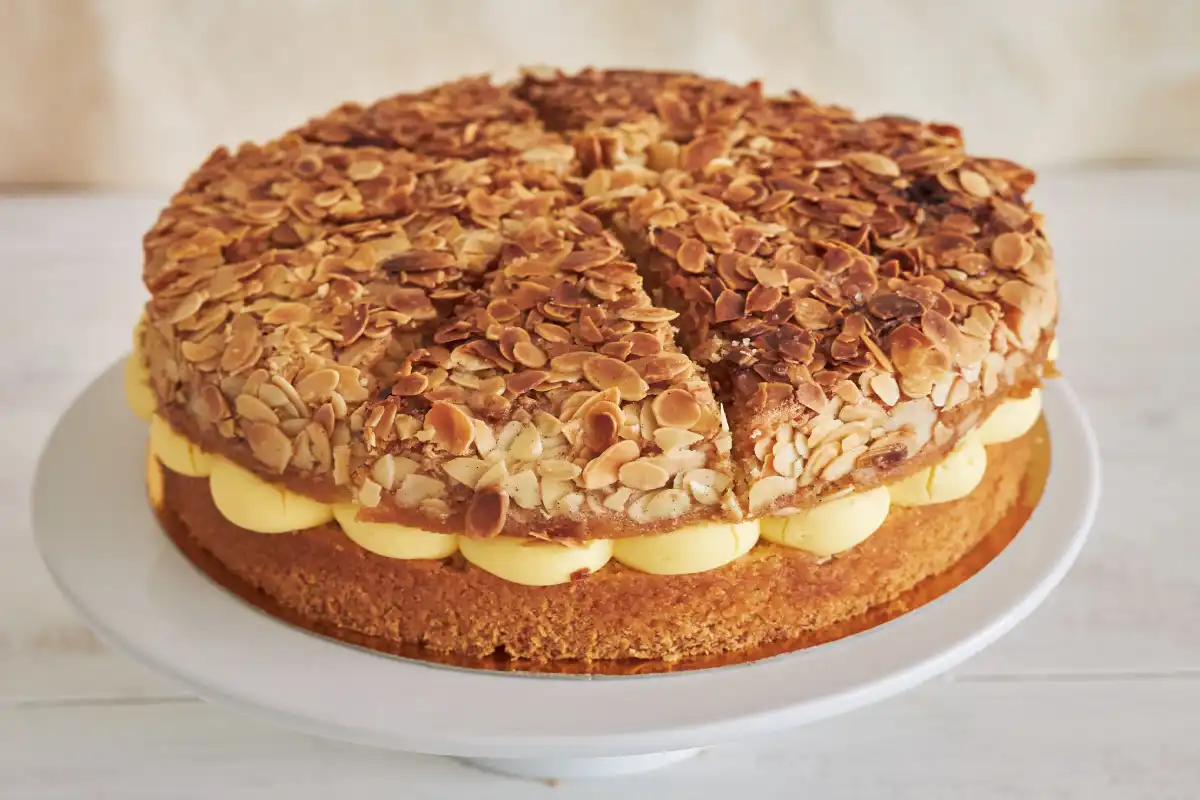 Decadent cheesecake topped with golden-brown toasted almonds