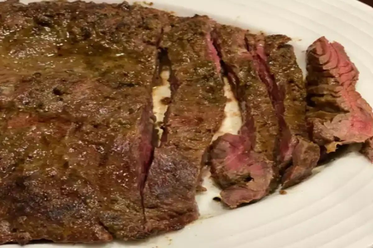 Succulent grilled flap meat sliced against the grain, showcasing the medium-rare cooking level.