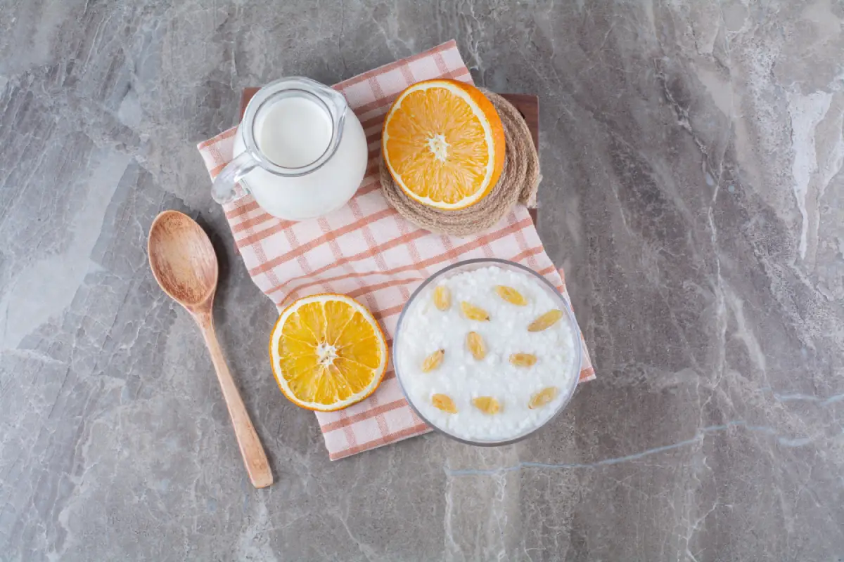 Ingredients for Orange Dreamsicle Salad preparation on a marble countertop