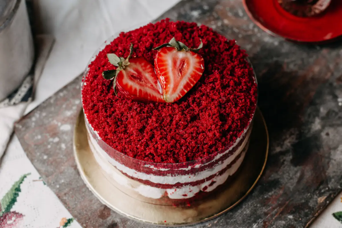 Red Velvet Cake with Strawberry Garnish on a Vintage Tray